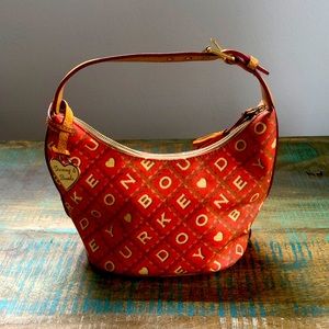 Dooney and Bourke purse. Orange and tan